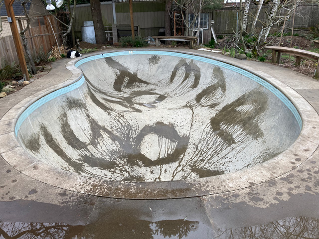 Used the bamboo broom to write some uncial letters with rainwater