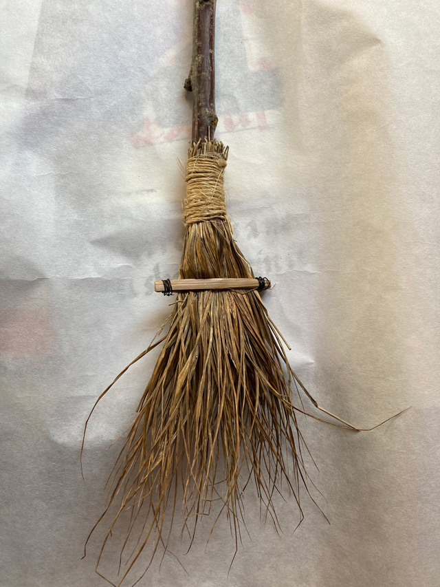 brush made with dead japanese forest grass leaves with bamboo handle